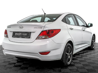 фото Hyundai Solaris I 2013